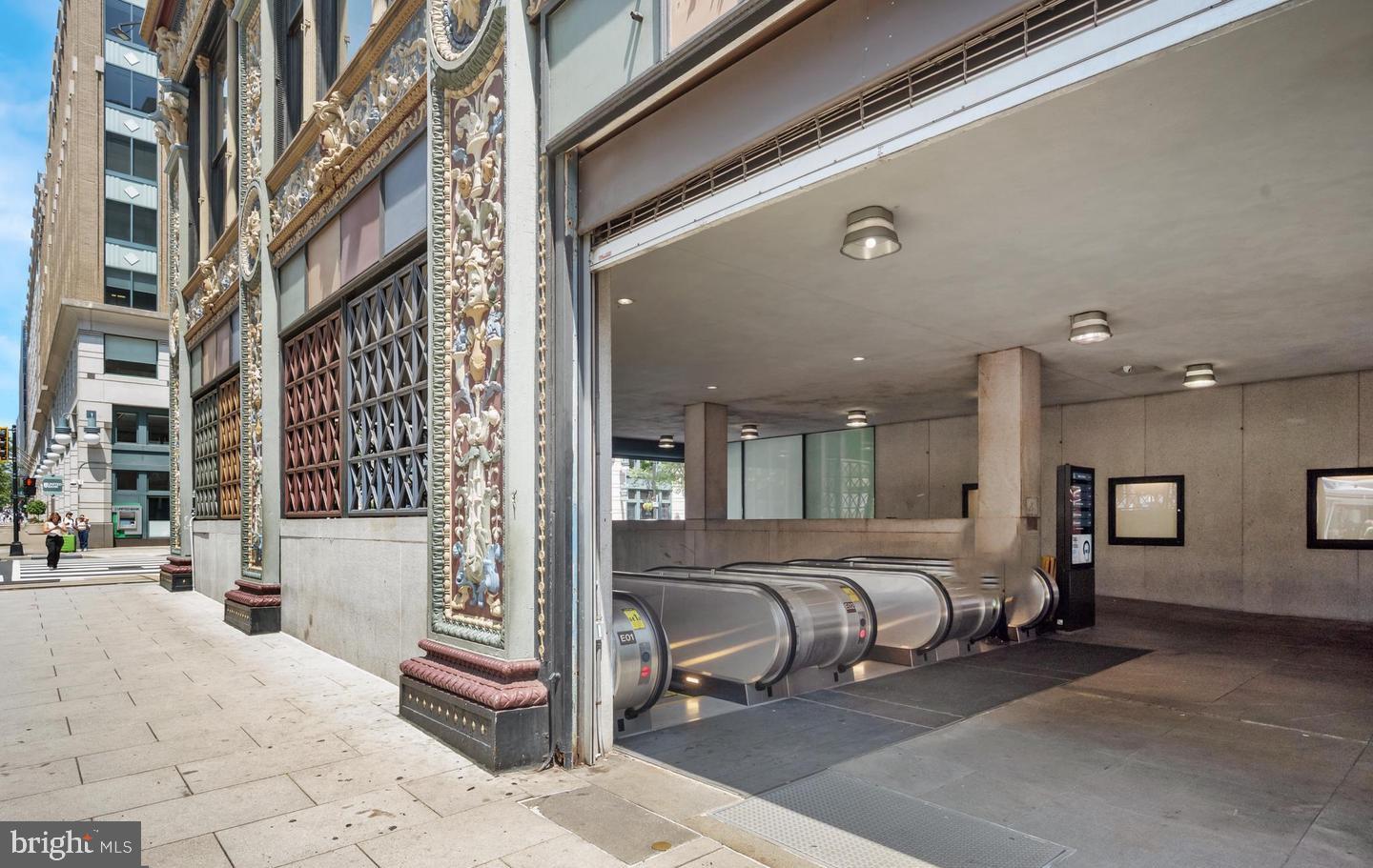 916 G St. Northwest, Unit 805 Washington, DC 20001 - Photo 18 of 19 a living room with a couch and chairs