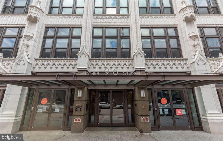 916 G St. Northwest, Unit 805 Washington, DC 20001 - Photo 3 of 19 a front view of a building with glass windows