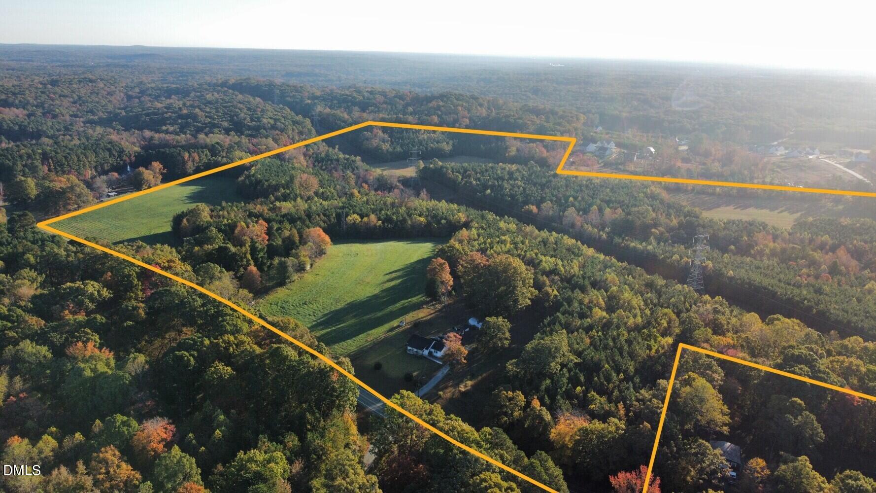 6900-6918 Russell Road Durham, NC 27712 - Photo 1 of 22 a view of a small yard