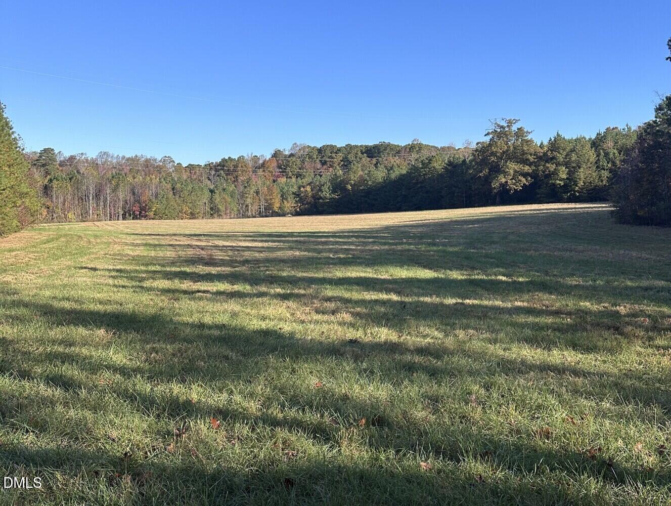 6900-6918 Russell Road Durham, NC 27712 - Photo 13 of 22 a view of a field with an ocean