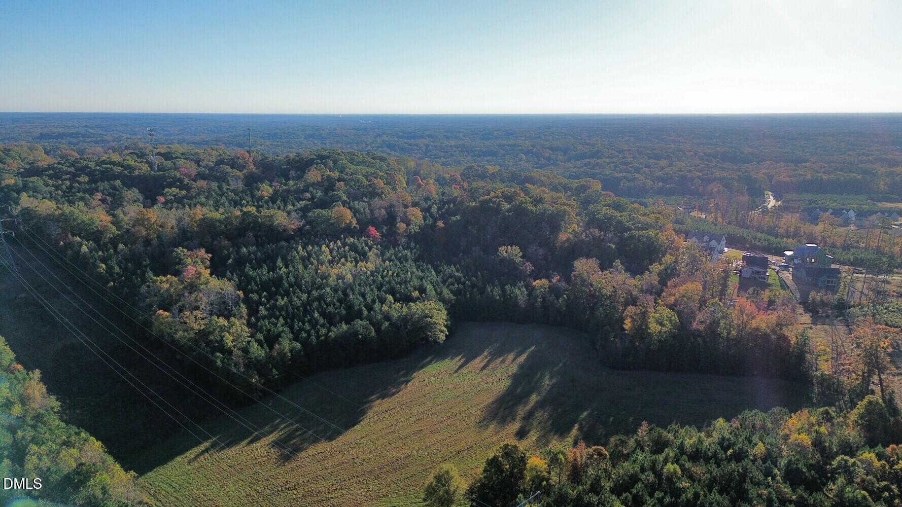 6900-6918 Russell Road Durham, NC 27712 - Photo 7 of 22 an aerial view of residential house and outdoor space