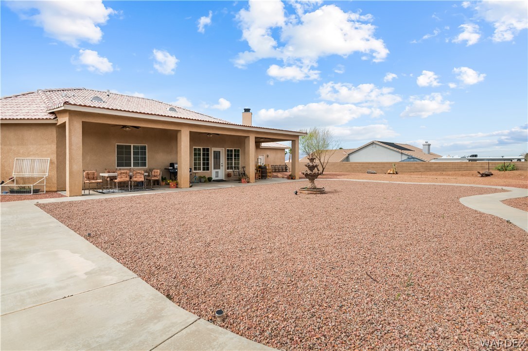 2898 Mountain Trail Road Kingman, AZ 86401 - Photo 51 of 75 a view of a house with a outdoor space