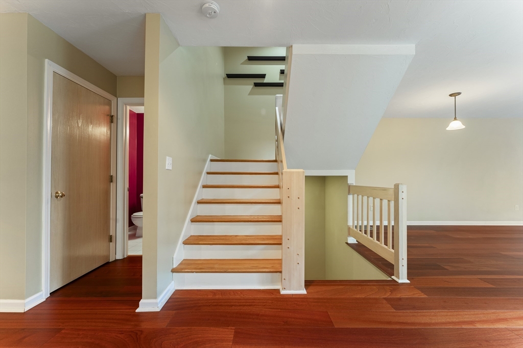 22 Arrowhead Circle, Unit 22 Ashland, MA 01721 - Photo 29 of 35 a view of entryway and hall with wooden floor