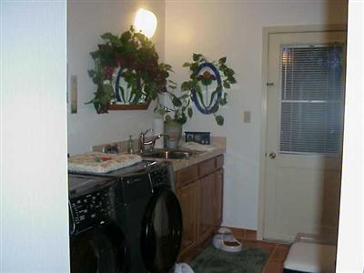 321 Sanel Drive Ukiah, CA 95482 - Photo 9 of 12 a bathroom with a sink and a mirror