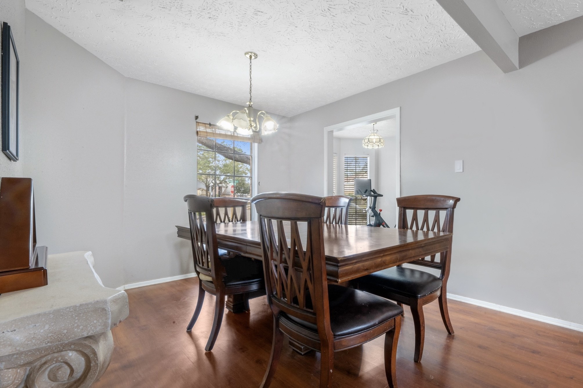 17314 Edenbridge Court Spring, TX 77379 - Photo 11 of 33 a view of a dining room with furniture window and wooden floor