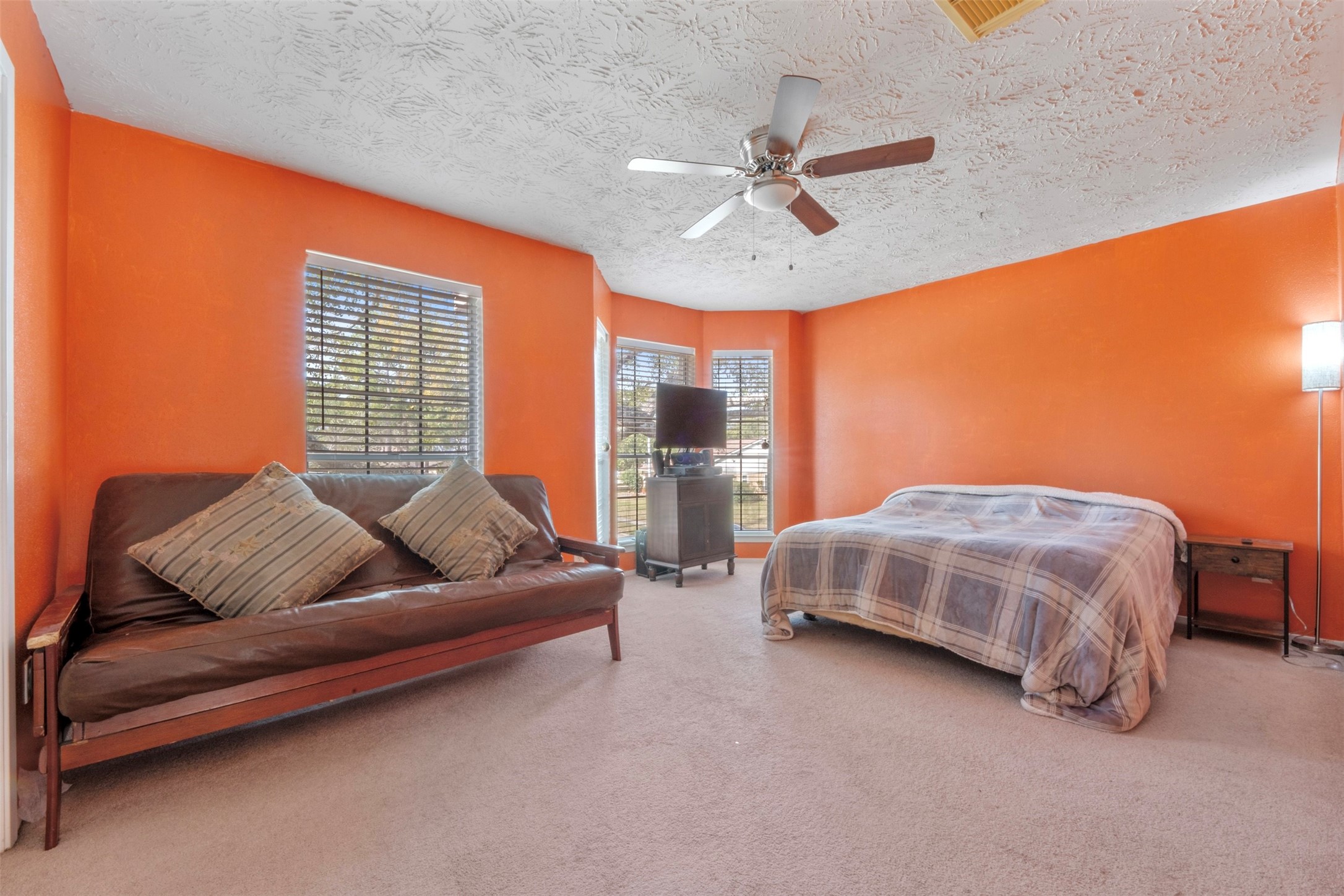 17314 Edenbridge Court Spring, TX 77379 - Photo 26 of 33 a bedroom with a bed couch and window