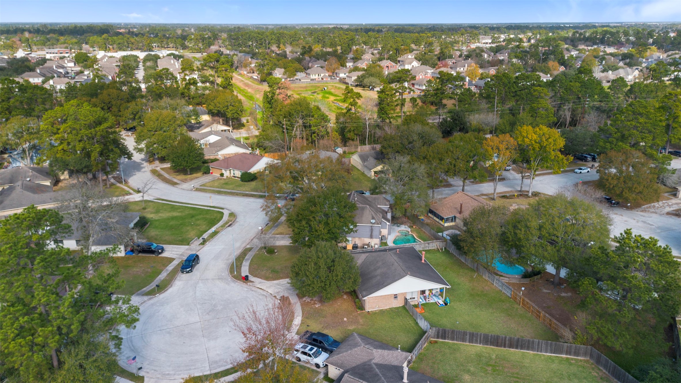17314 Edenbridge Court Spring, TX 77379 - Photo 31 of 33 an aerial view of residential houses with outdoor space and trees