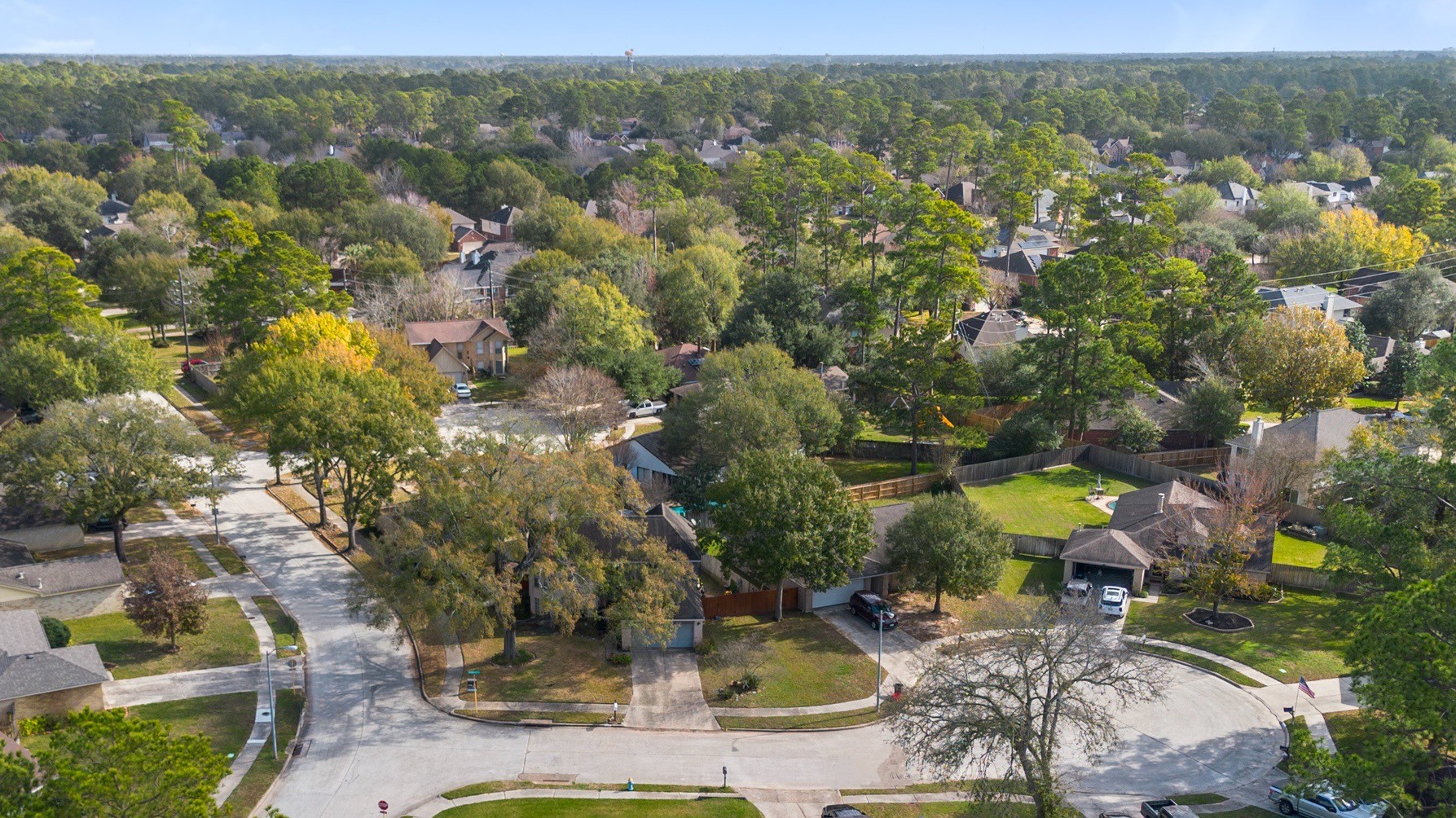 17314 Edenbridge Court Spring, TX 77379 - Photo 32 of 33 an aerial view of residential houses with outdoor space and trees