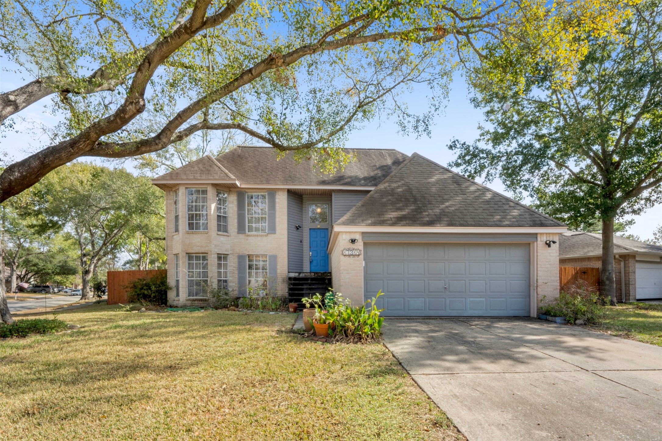 17314 Edenbridge Court Spring, TX 77379 - Photo 33 of 33 a front view of a house with a garden