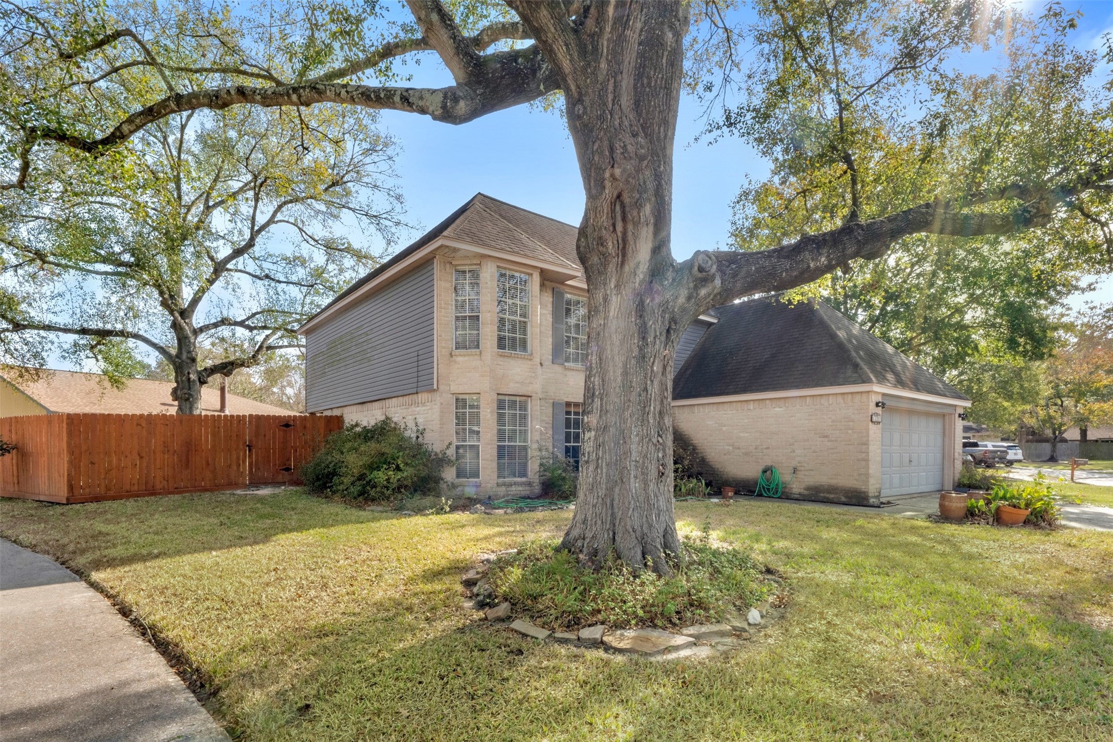 17314 Edenbridge Court Spring, TX 77379 - Photo 8 of 33 a front view of house with yard and trees around