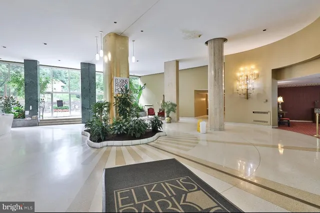 a view of backyard with a table and chairs