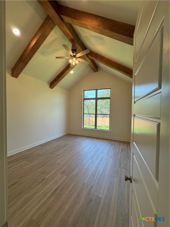 5903 Whippoorwill Road Temple, TX 76502 - Photo 11 of 27 a view of an empty room with a window and wooden floor