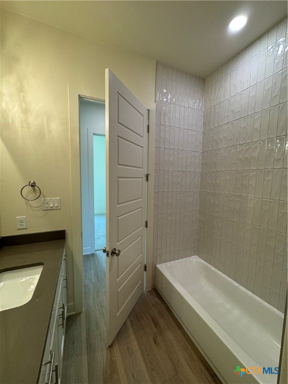 5903 Whippoorwill Road Temple, TX 76502 - Photo 17 of 27 a bathroom with a granite countertop sink a toilet and shower