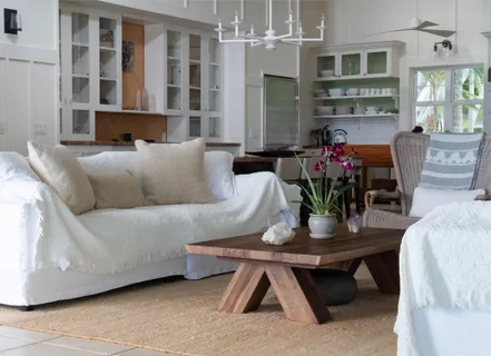 a bathroom with a toilet tub and a shower