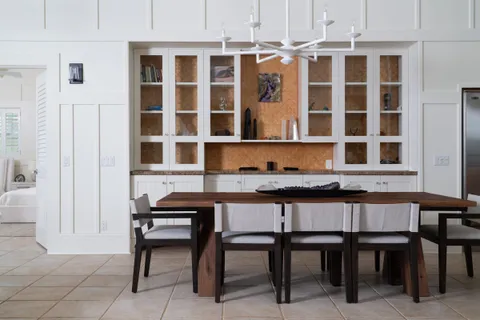 a bathroom with granite countertop a sink and a mirror