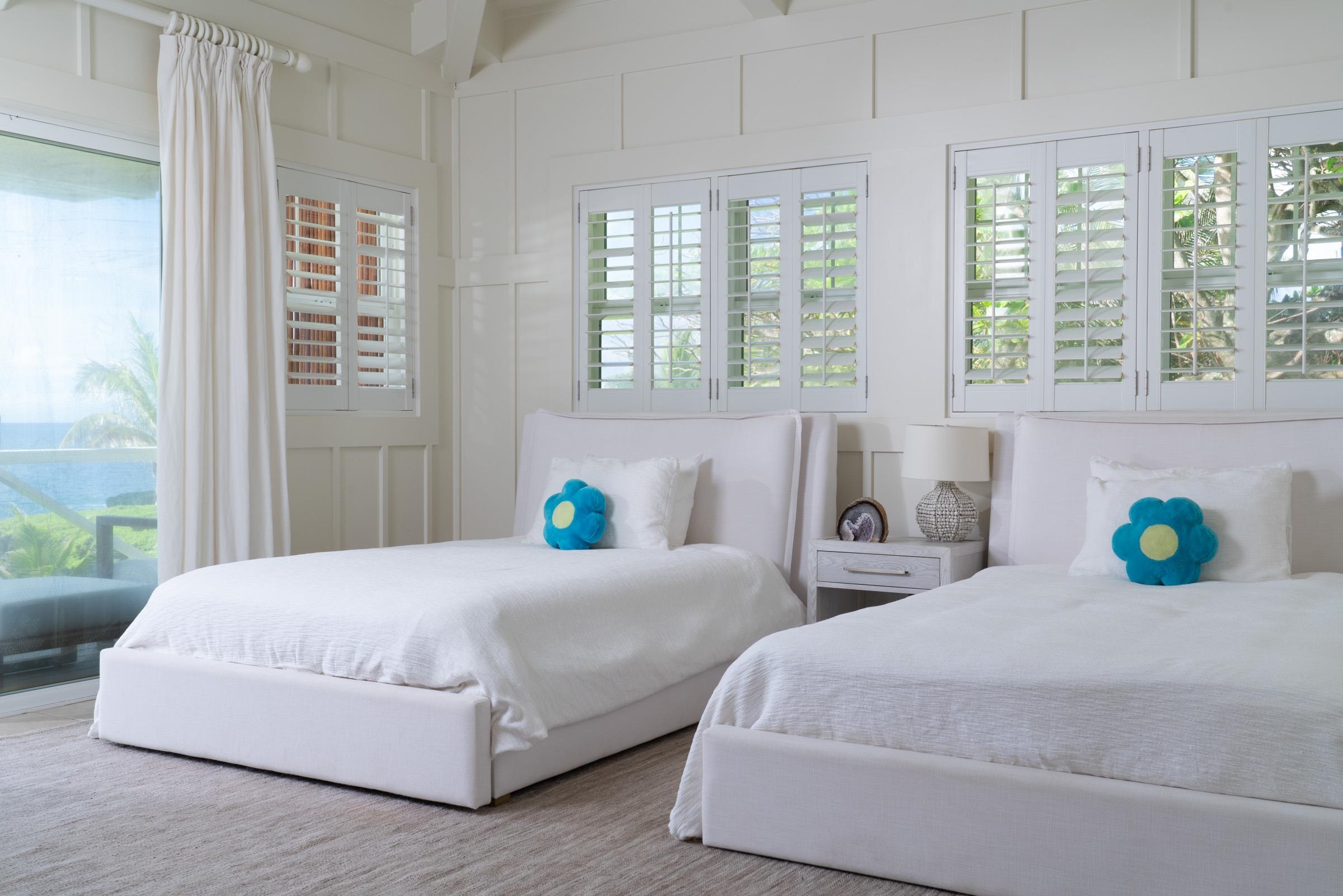 51 Kapohue Road Hana, HI 96713 - Photo 24 of 50 a bedroom with bed and a window