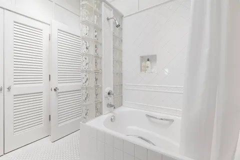 a view of a house with pool and garden