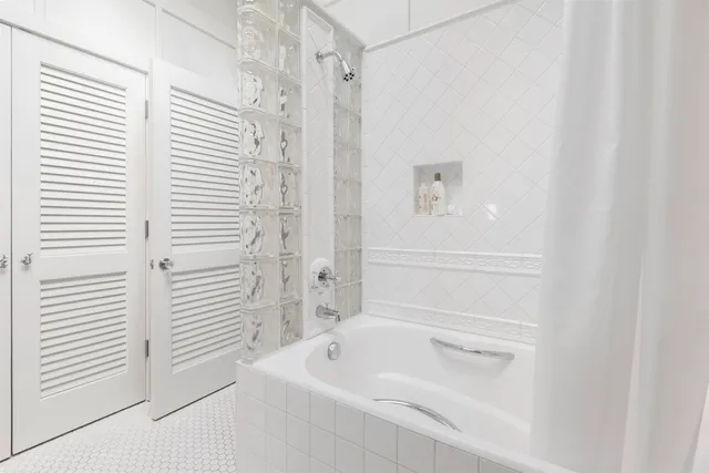 a view of a house with pool and garden