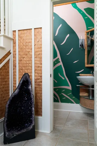 a view of a house with a window and wooden fence