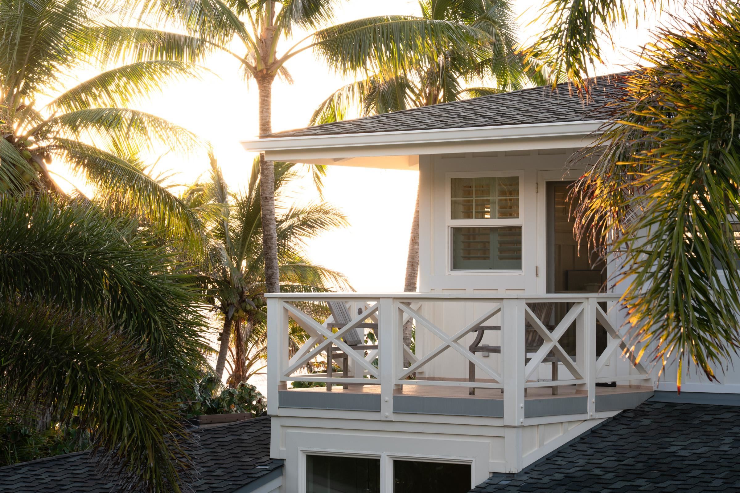 51 Kapohue Road Hana, HI 96713 - Photo 46 of 50 a view of a house with a window and wooden fence
