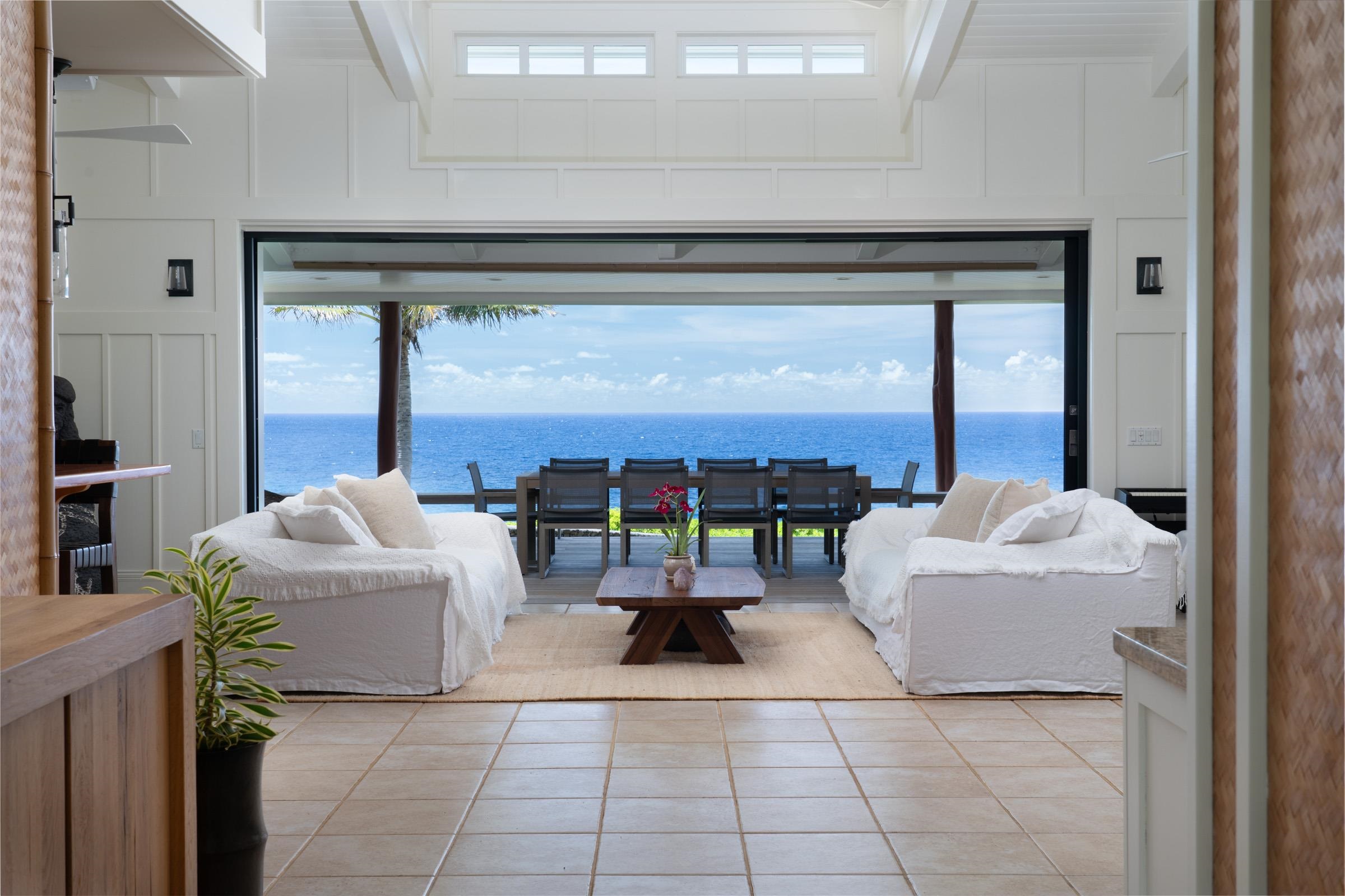 51 Kapohue Road Hana, HI 96713 - Photo 6 of 50 a living room with furniture and a floor to ceiling window