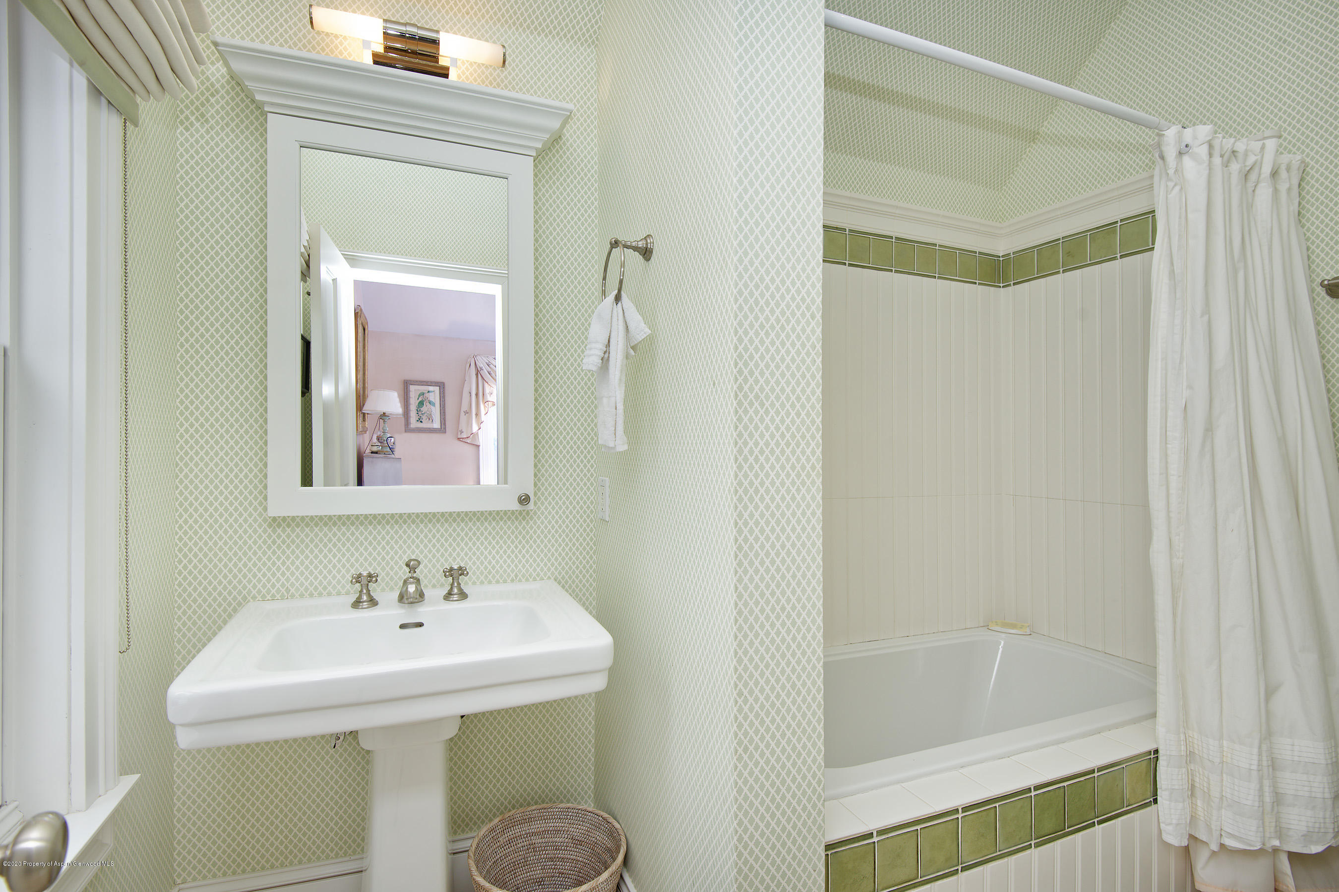 716 West Francis Street Aspen, CO 81611 - Photo 12 of 26 a bathroom with a sink a toilet and shower