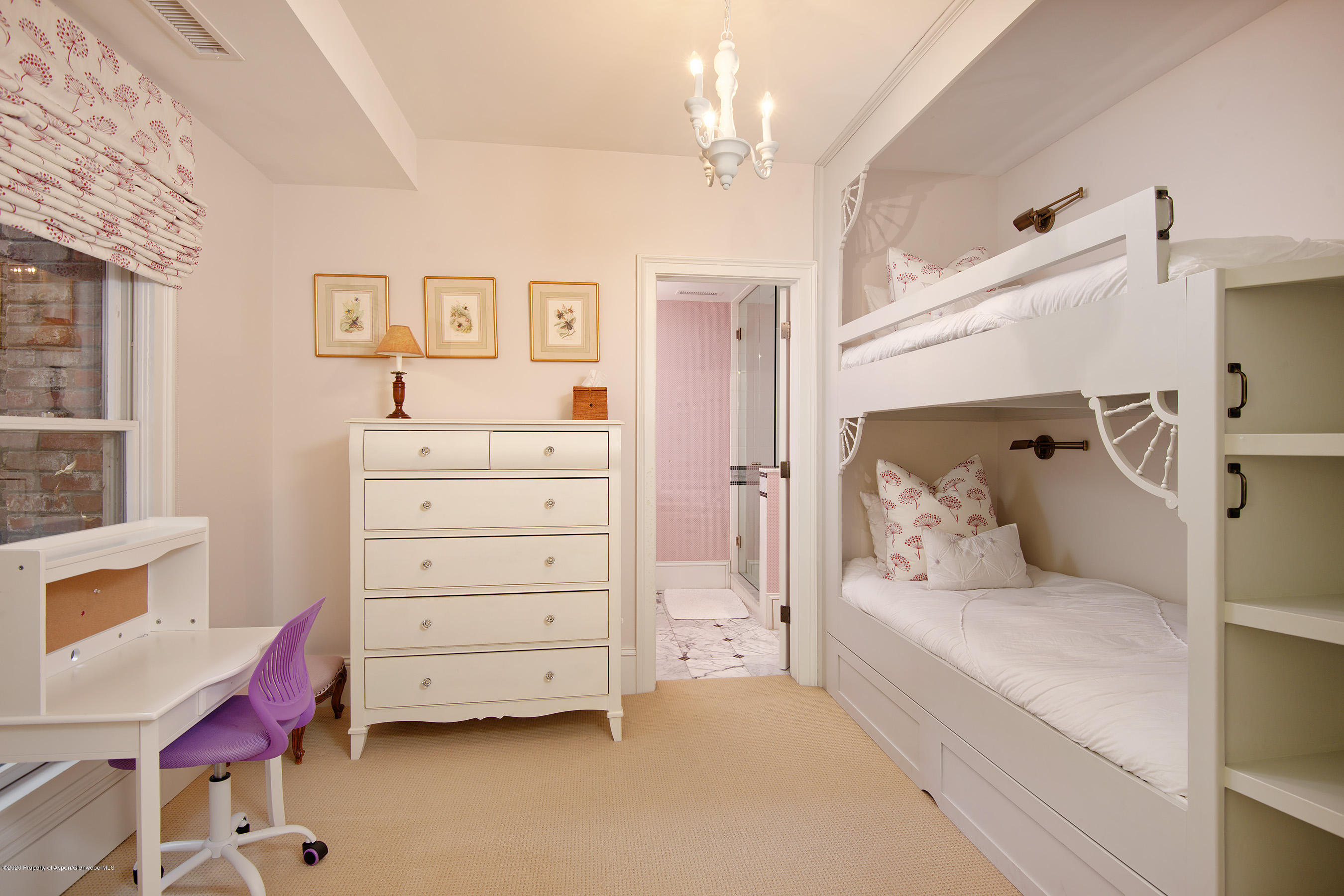 716 West Francis Street Aspen, CO 81611 - Photo 19 of 26 a bedroom with a bed and a dresser