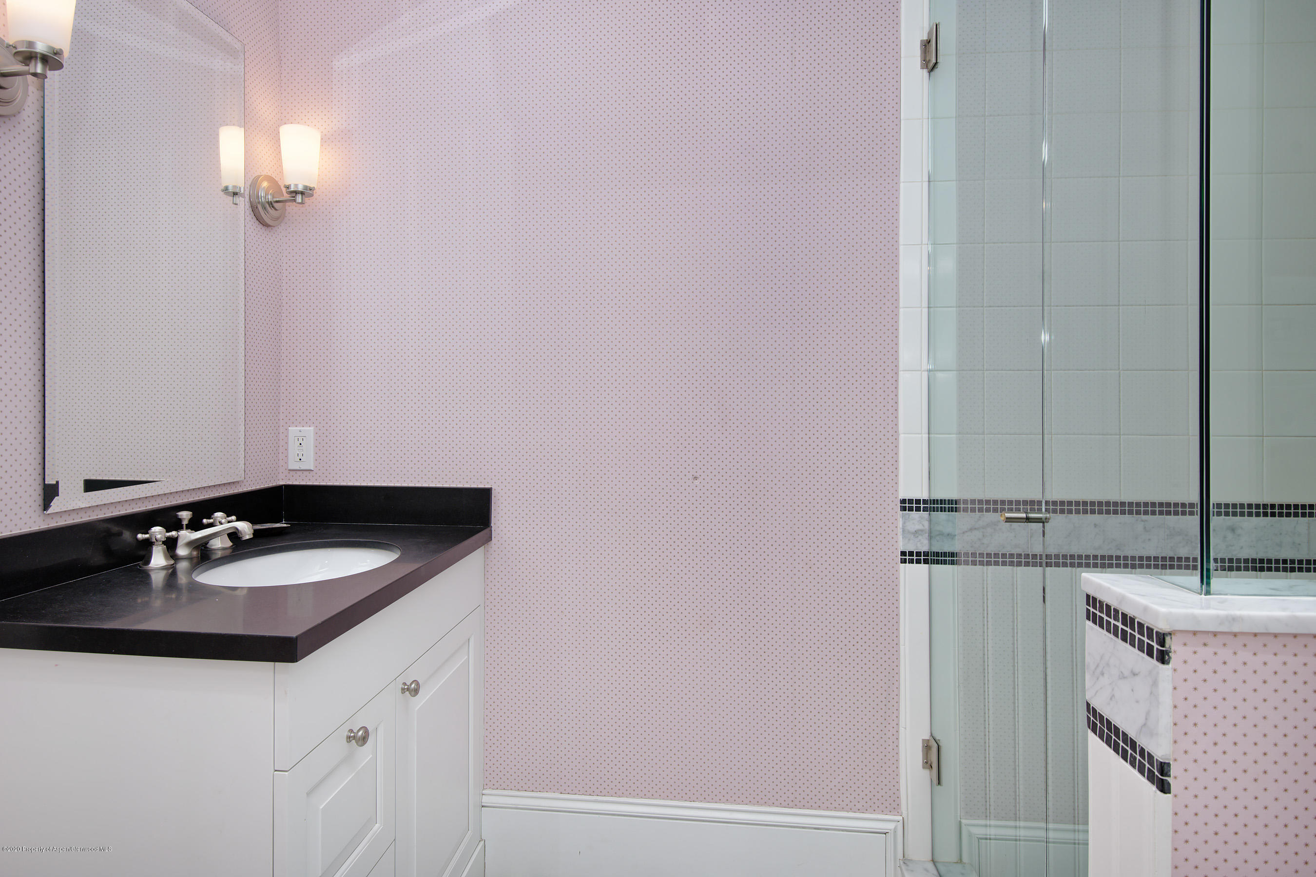 716 West Francis Street Aspen, CO 81611 - Photo 20 of 26 a bathroom with a sink and a mirror