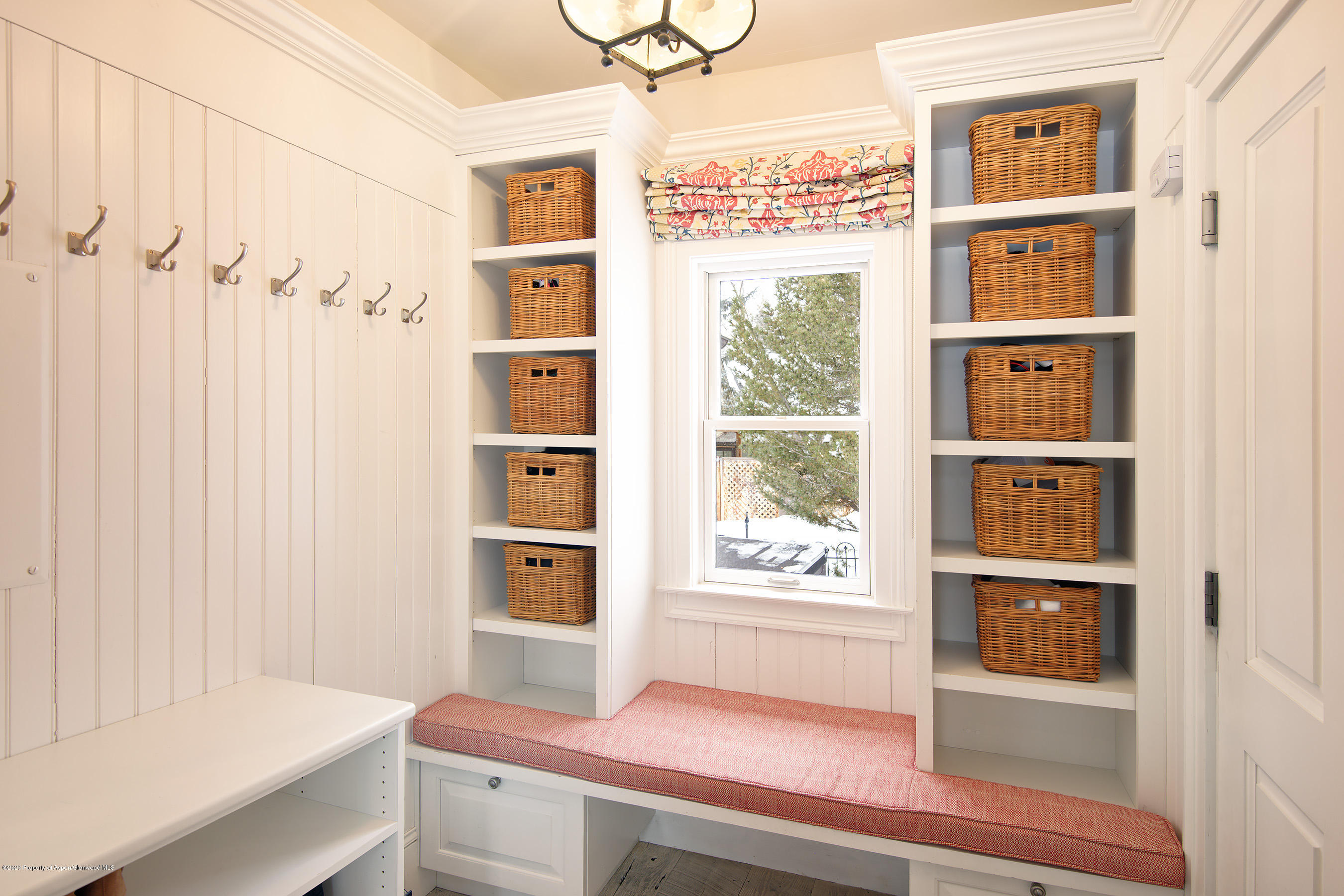 716 West Francis Street Aspen, CO 81611 - Photo 21 of 26 a room that has a bed and a window in it