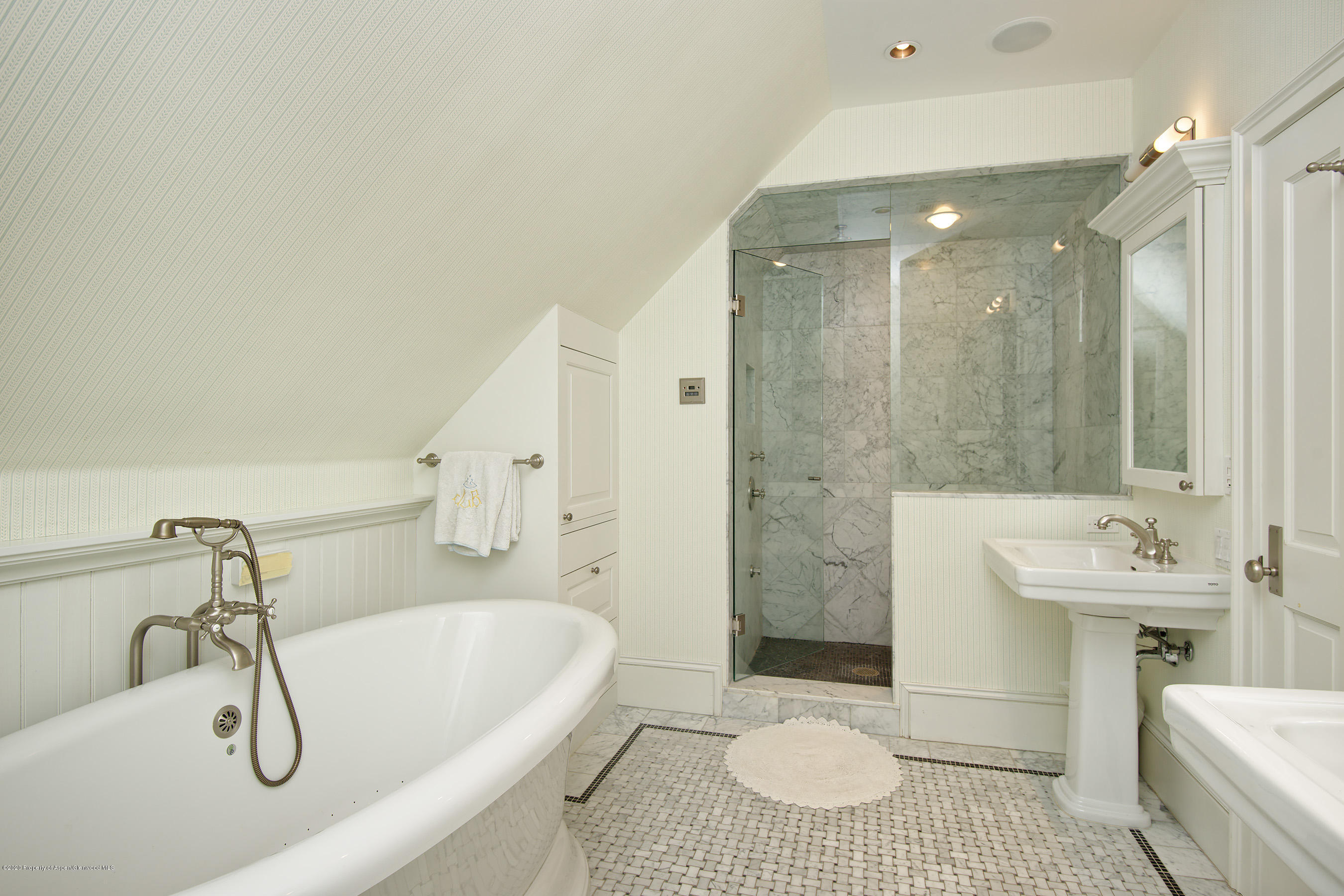 716 West Francis Street Aspen, CO 81611 - Photo 9 of 26 a bathroom with a sink a toilet and shower