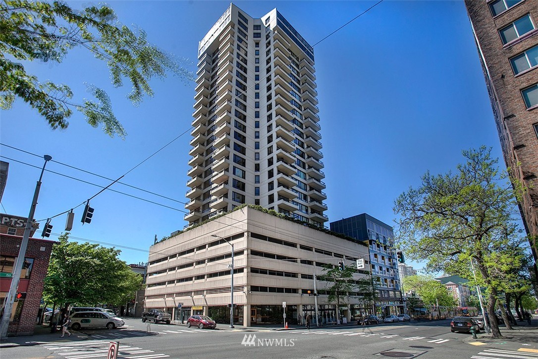2201 3rd Avenue, Unit 1001 Seattle, WA 98121 - Photo 1 of 20 a view of a tall building next to a road