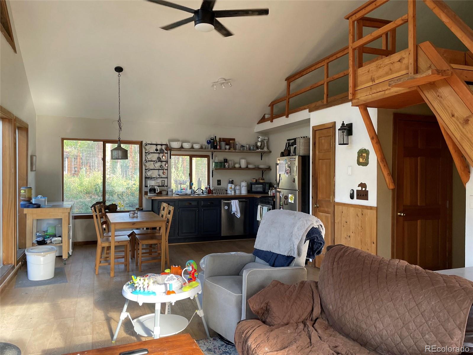 69 County Road 114 Bailey, CO 80421 - Photo 7 of 34 a living room with furniture and a window