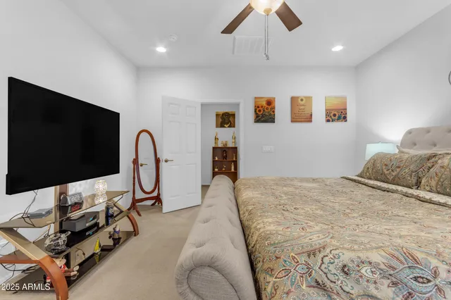a bathroom with a granite countertop sink a shower and a mirror