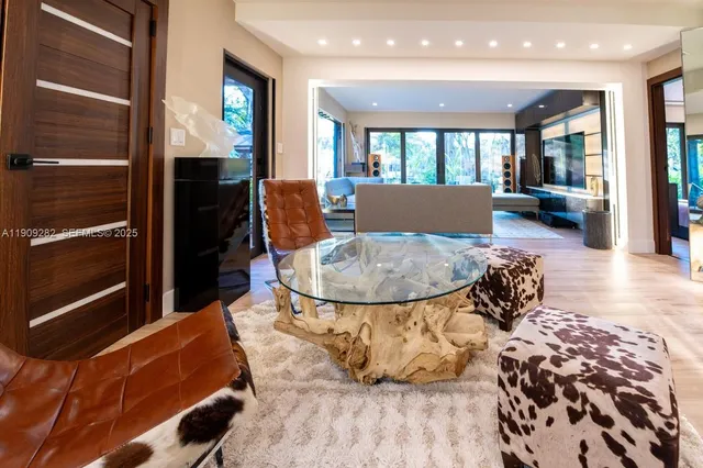 a lobby with furniture and a rug