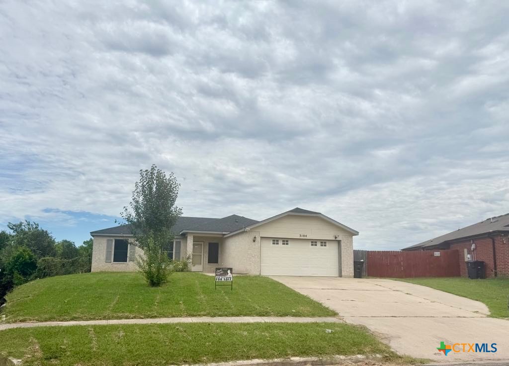 3104 Viewcrest Drive Killeen, TX 76549 - Photo 1 of 1 a front view of a house with a garden