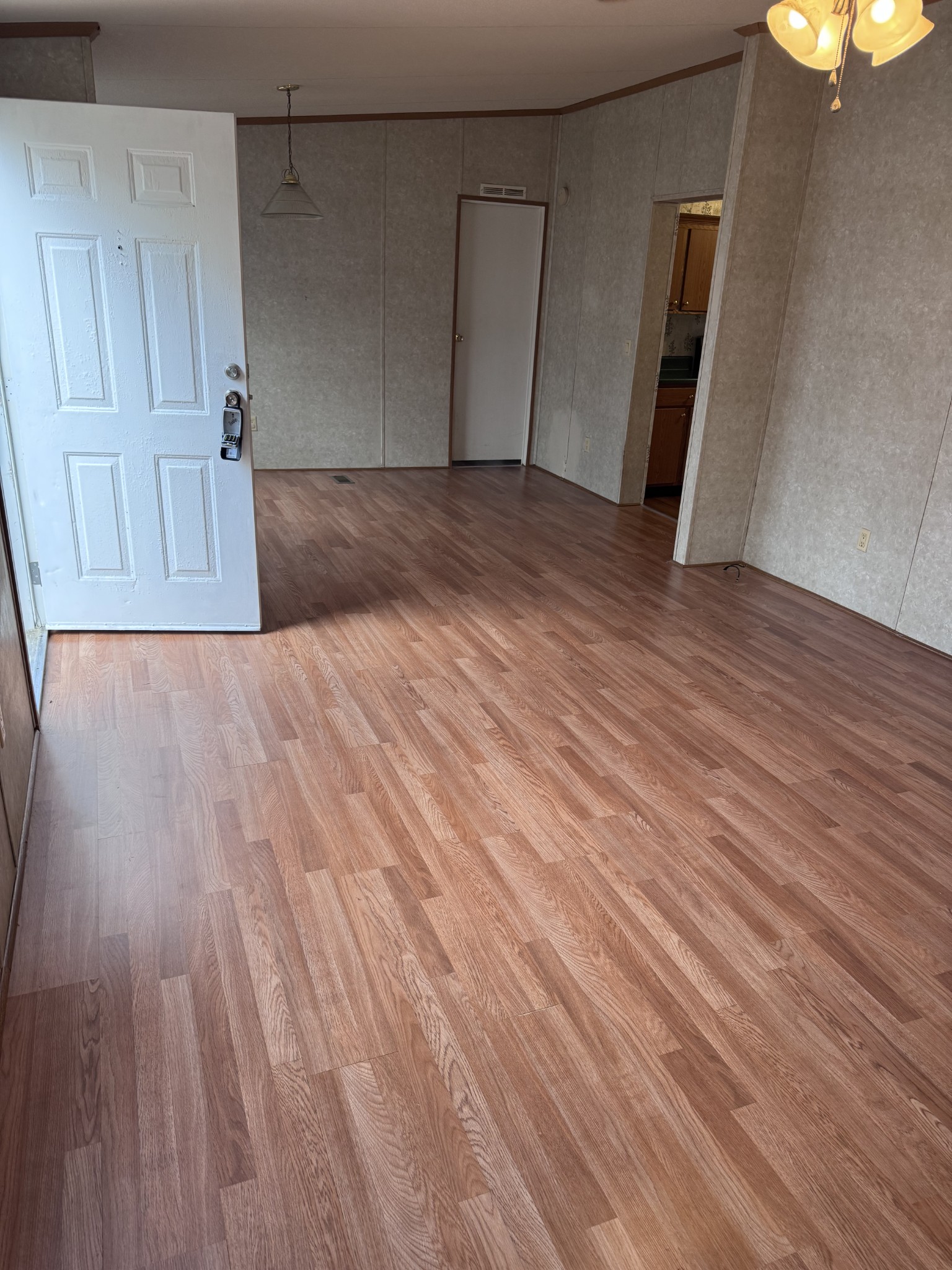 3392 Bates Road Lyles, TN 37098 - Photo 2 of 15 a view of a livingroom with wooden floor