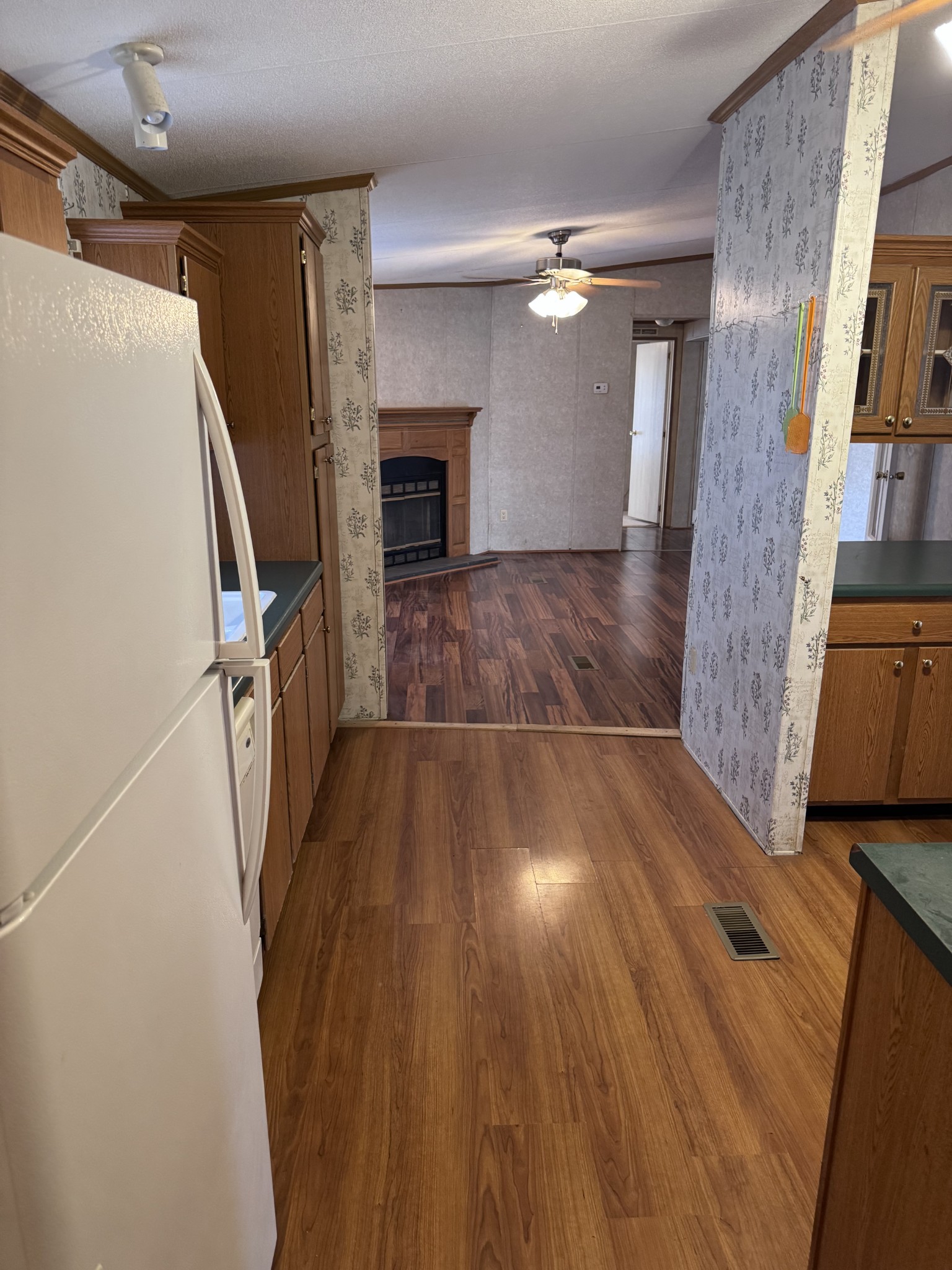 3392 Bates Road Lyles, TN 37098 - Photo 5 of 15 a view of empty room with wooden floor and fan