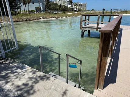 a view of swimming pool from a balcony