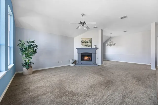 a view of a kitchen with refrigerator and microwave