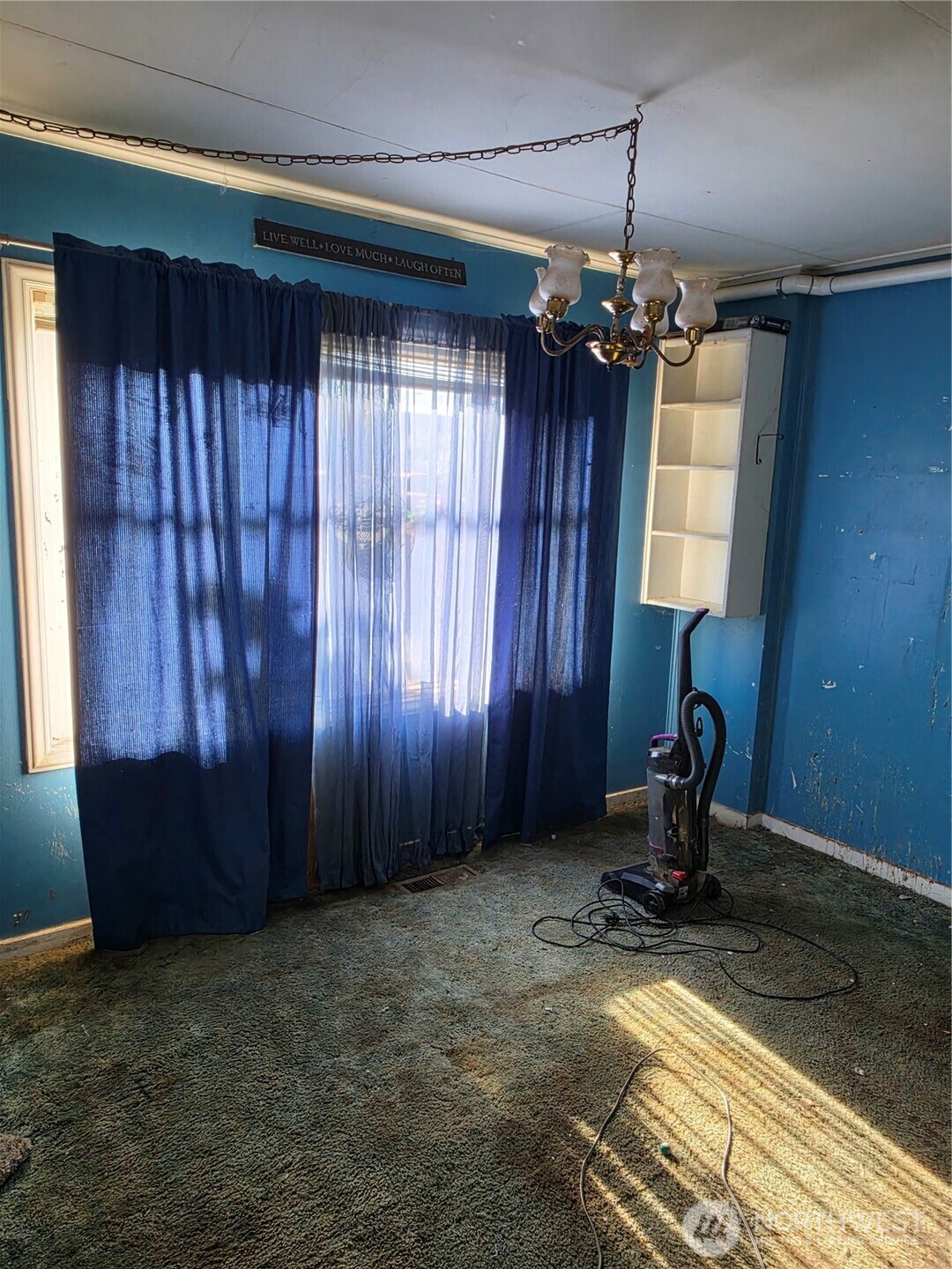 1518 West 1st Street Aberdeen, WA 98520 - Photo 8 of 17 a view of a room with a window and storage