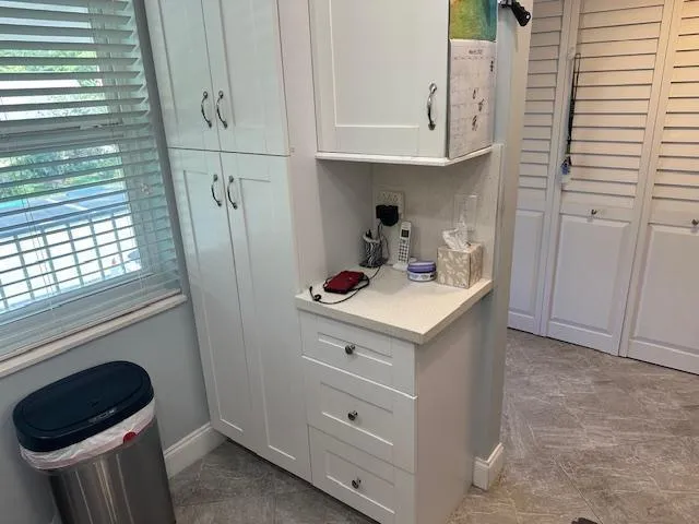 a bathroom with a sink toilet and vanity