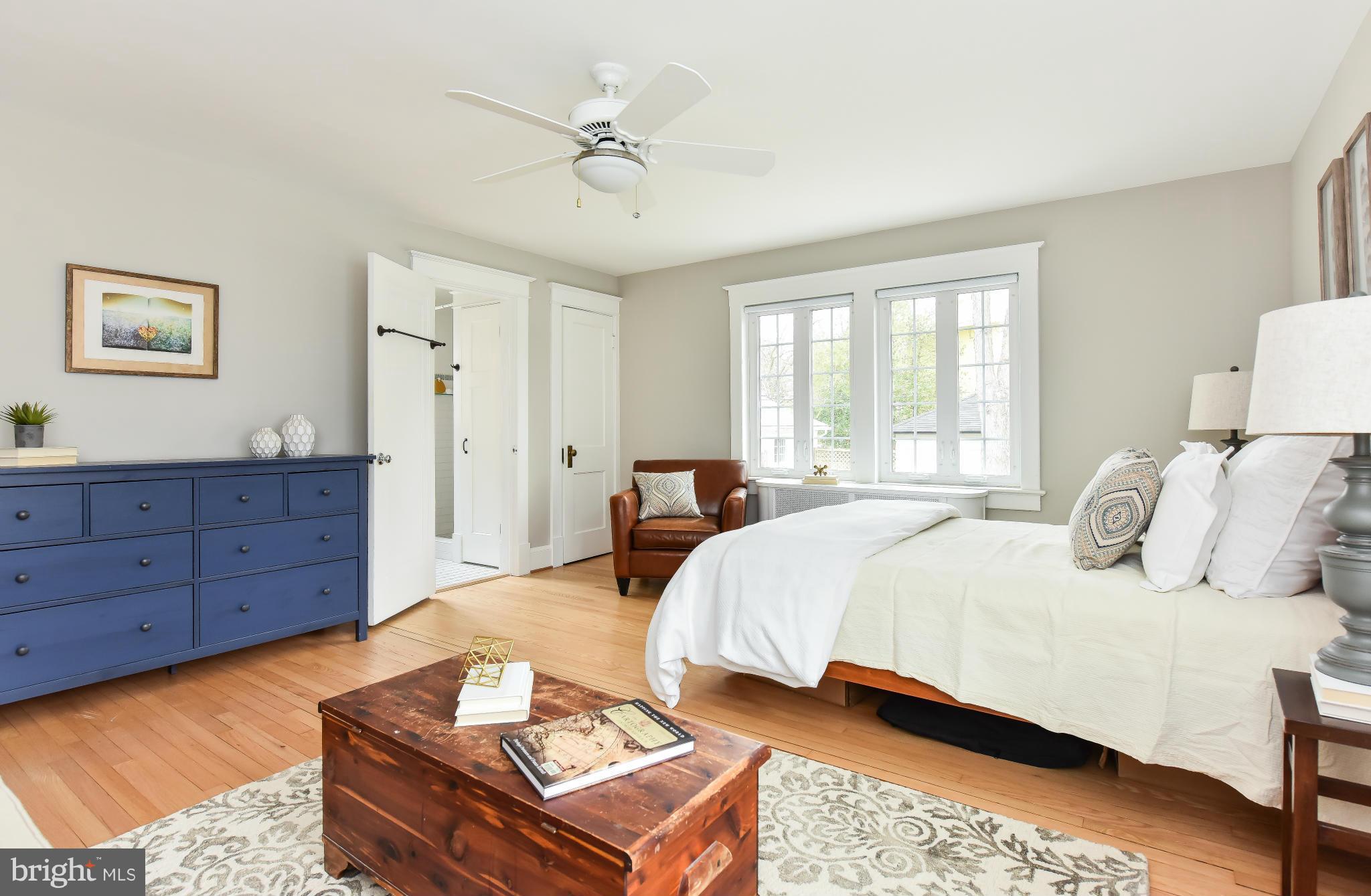 5517 Broad Branch Road Northwest Washington, DC 20015 - Photo 17 of 25 a bedroom with a bed and a dresser