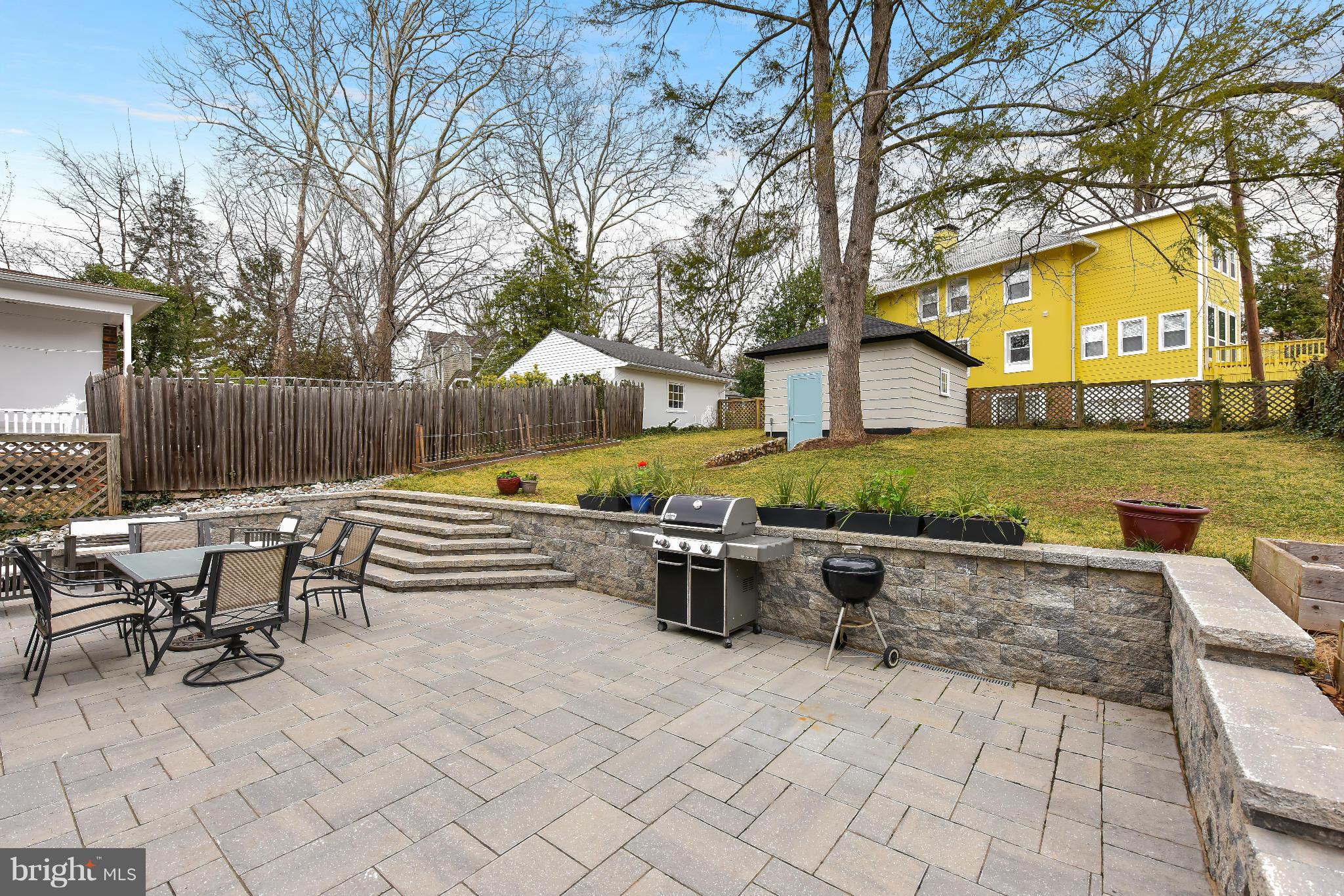 5517 Broad Branch Road Northwest Washington, DC 20015 - Photo 22 of 25 a view of backyard with seating space and trees