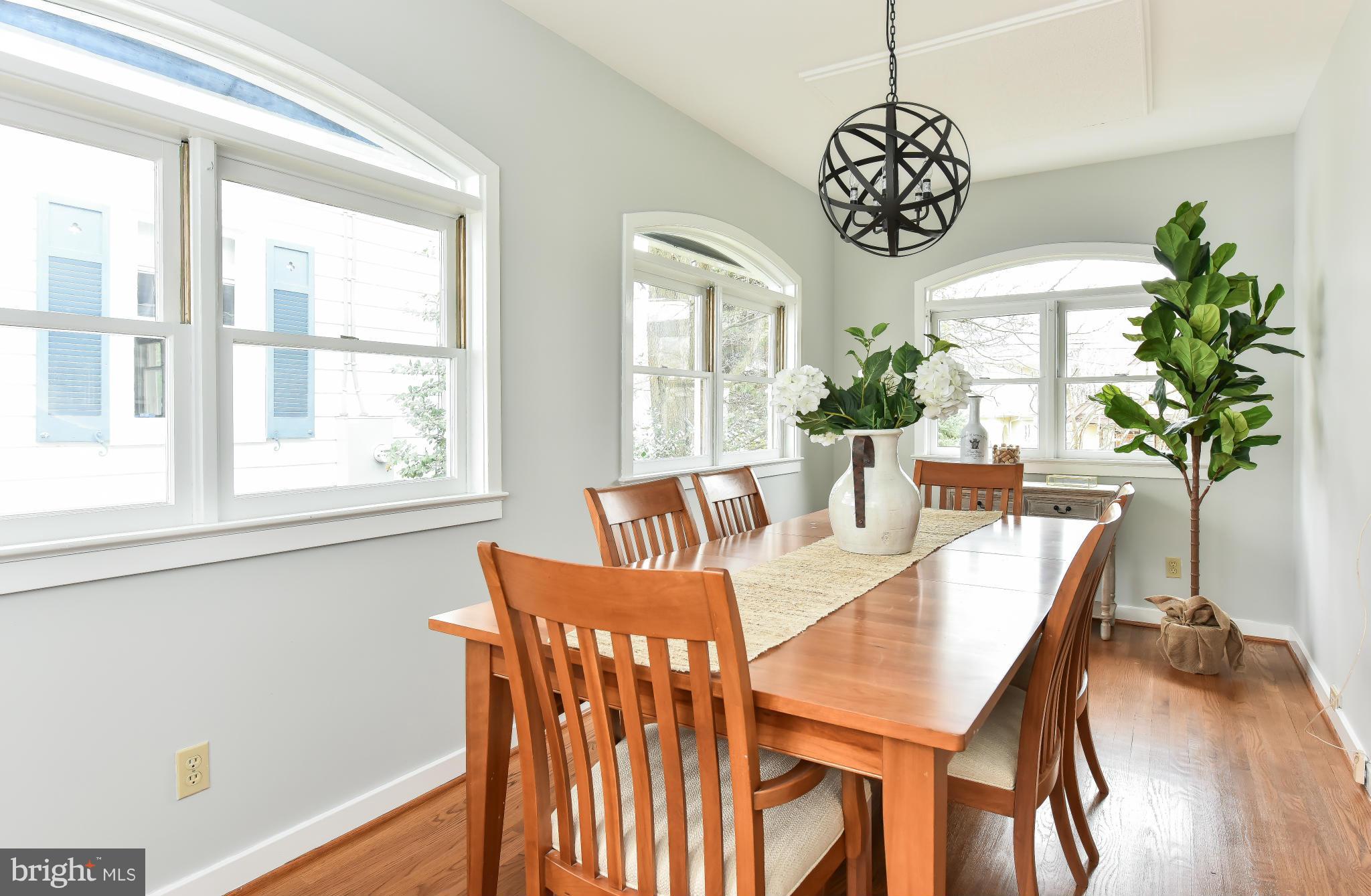 5517 Broad Branch Road Northwest Washington, DC 20015 - Photo 9 of 25 a view of a dining room with furniture window and wooden floor