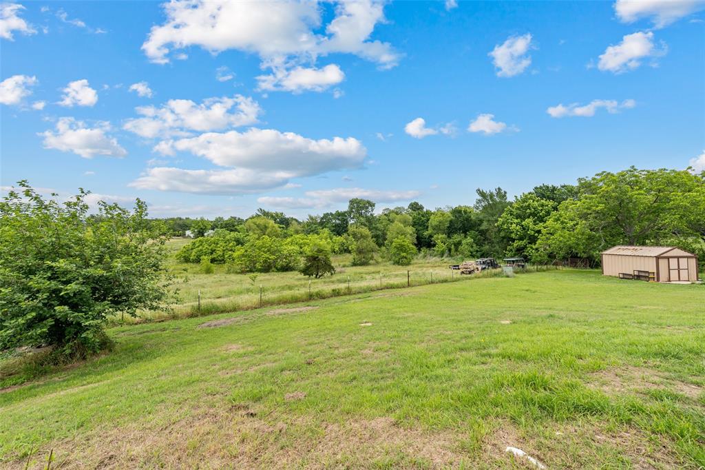 608 West Spring Street West, TX 76691 - Photo 25 of 27 a view of an ocean and a yard