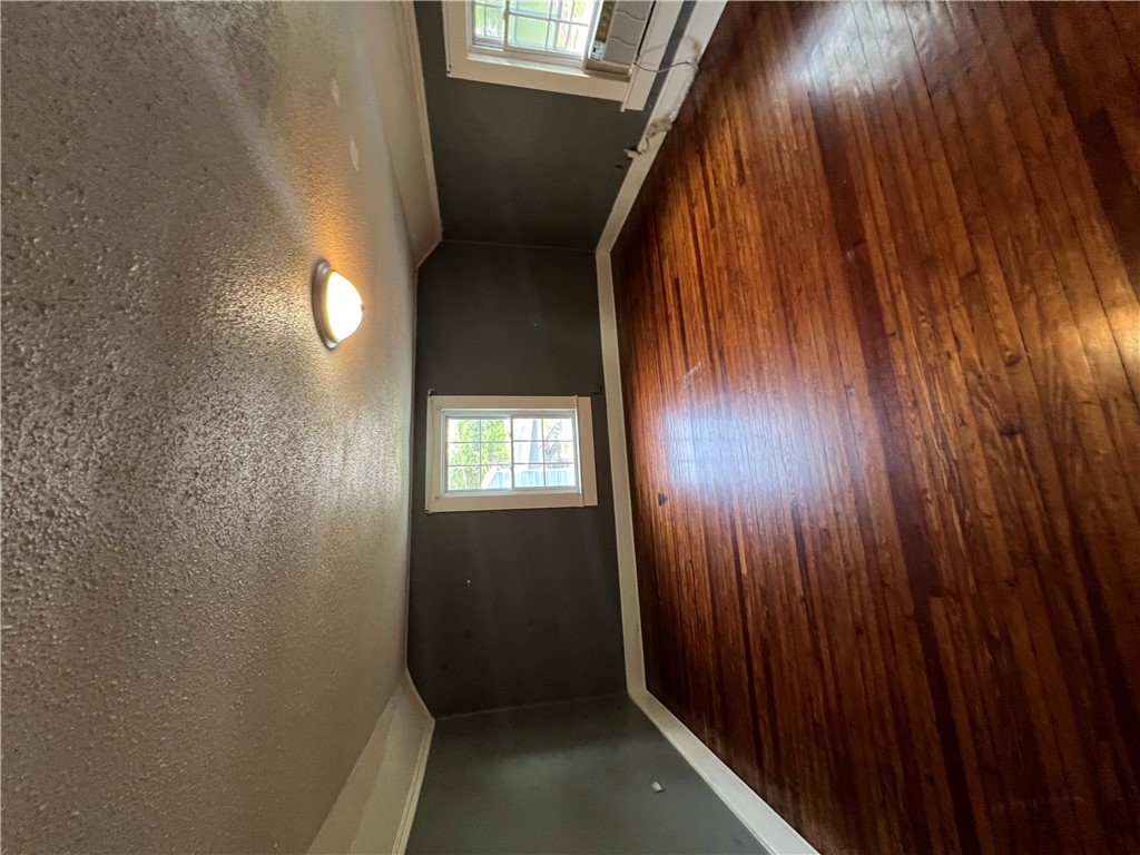 309 Jaynes Street Walhalla, SC 29691 - Photo 5 of 12 Rich hardwood flooring complements natural light from double windows in this inviting room.