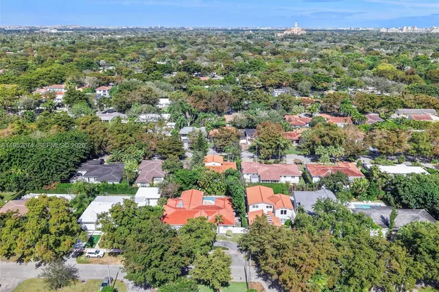 an aerial view of a city with lots of residential buildings