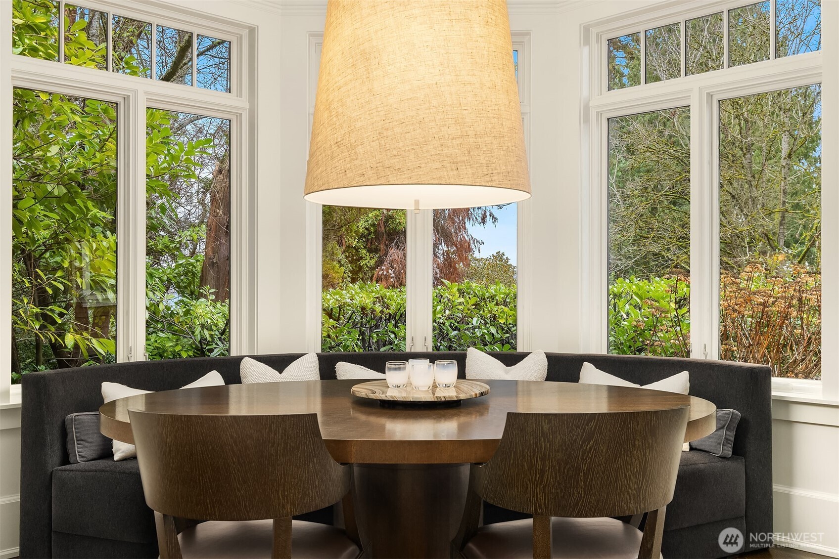 3814 East John Street Seattle, WA 98112 - Photo 13 of 26 a view of a dining room with furniture window and outside view