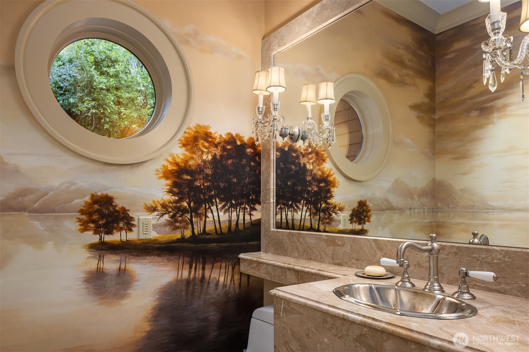 3814 East John Street Seattle, WA 98112 - Photo 14 of 26 a bathroom with a sink and a mirror