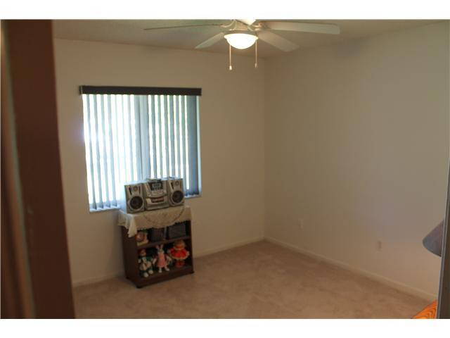 22369 Boulder Street Boca Raton, FL 33428 - Photo 13 of 15 a kitchen with a window